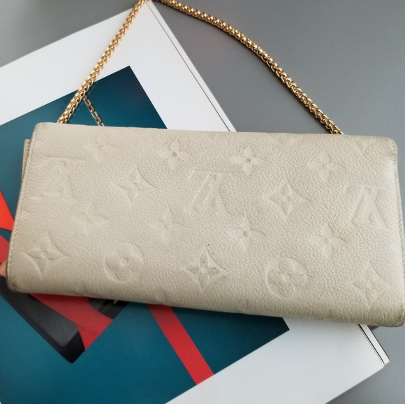 LOUIS VUITTON Portefeuille Empreinte Neige Mono - Picture 15 of 16